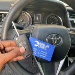 Toyota Keys infront of steering wheel